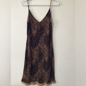 Women’s dress. Spaghetti strap. Size medium. above the knee